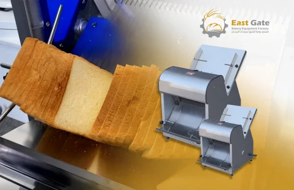 Technician cleaning a commercial bread slicer in a professional kitchen